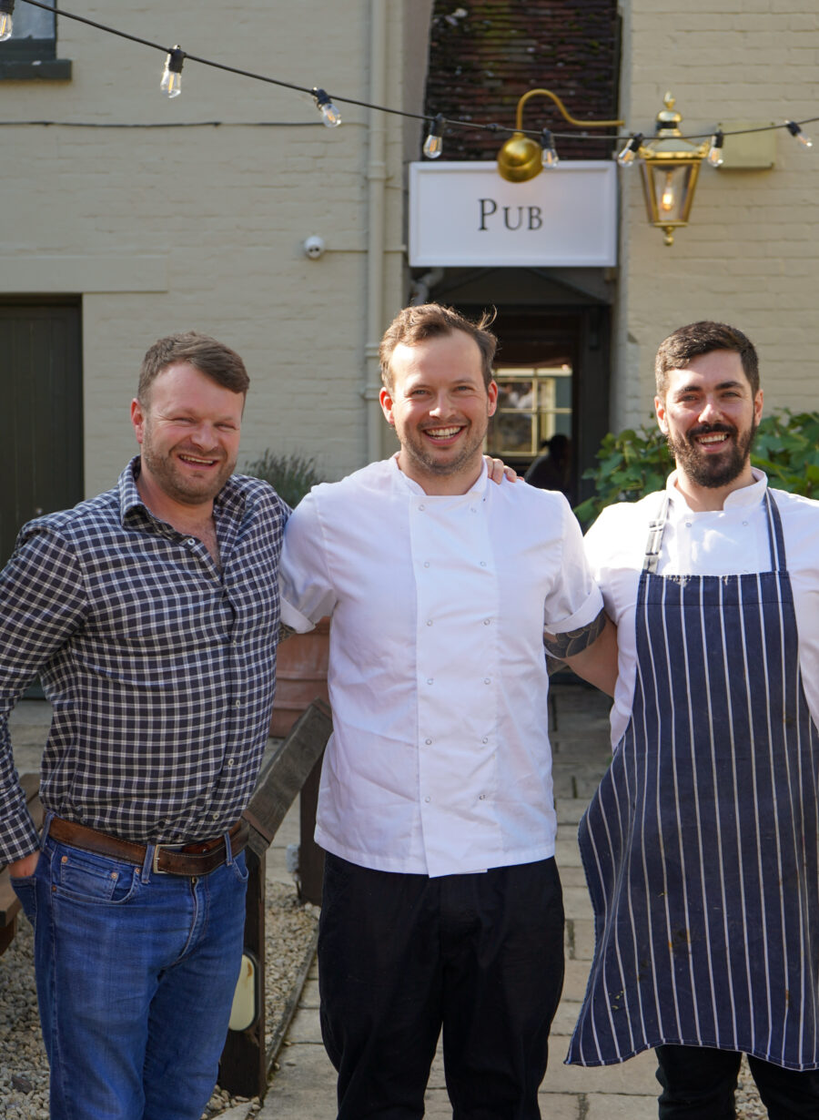 hospitality staff standing together outside